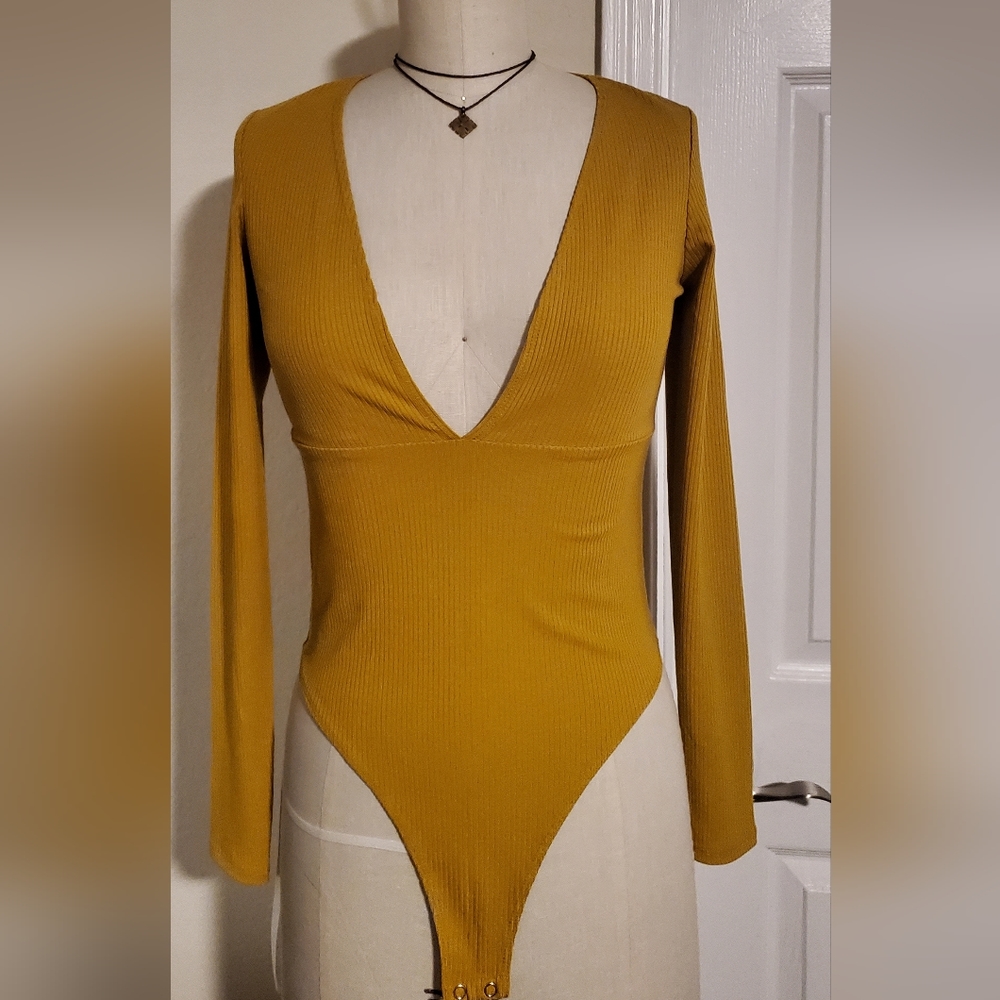 F21 yellow ribbed bodysuit deep v-neck